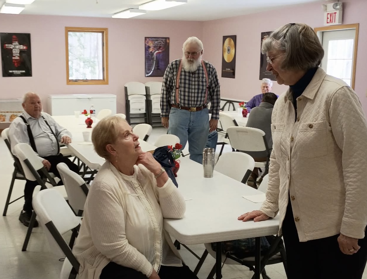 Church community members in fellowship.